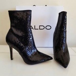 Stiletto pump boots